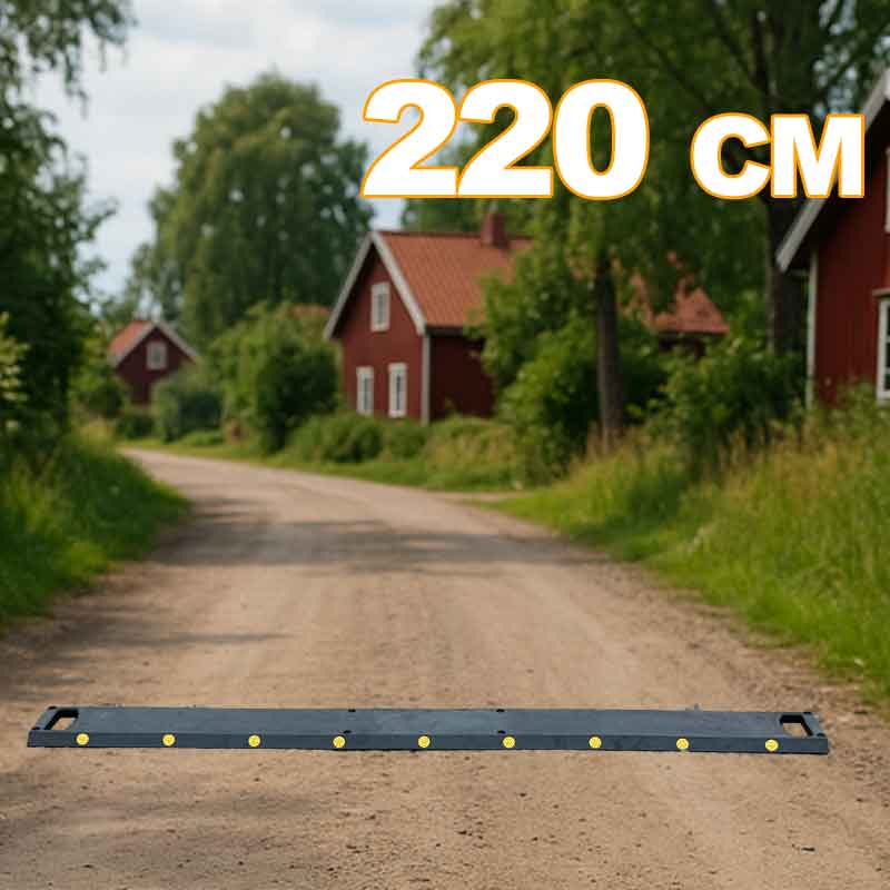 Farthinder Vakna Svart – tillfälligt farthinder på grusväg i svenskt bostadsområde